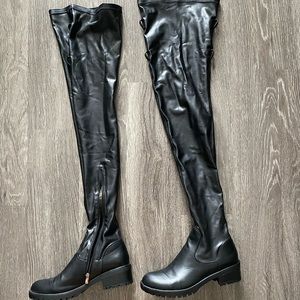 Akira black thigh high boots.